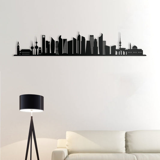City skyline wall decal on a white wall with a lamp and sofa in the foreground